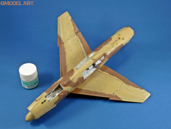 Model airplane with camouflage paint