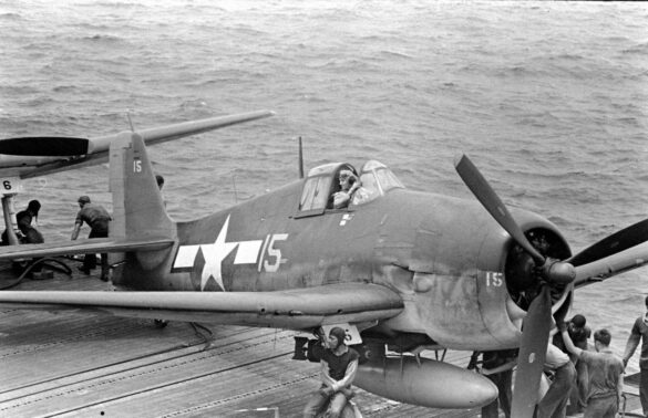 F6F Hellcat – Air Group 16 USS Lexington (CV-16) F6F-3 Hellcat Air Group 16 in tricolor variant aboard USS Lexington CV-16 with pilots before the mission