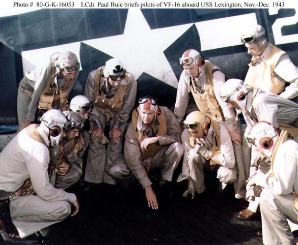 F6F Hellcat – Air Group 16 USS Lexington (CV-16) F6F-3 Hellcat Air Group 16 in tricolor variant aboard USS Lexington CV-16 with pilots before the mission