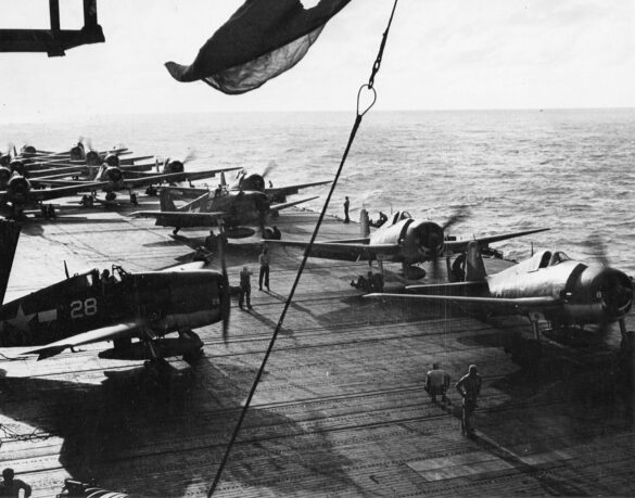 F6F Hellcat – Air Group 16 USS Lexington (CV-16) F6F-3 Hellcat Air Group 16 in tricolor variant aboard USS Lexington CV-16 with pilots before the mission
