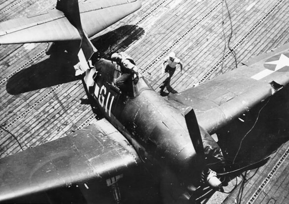 F6F Hellcat – Air Group 16 USS Lexington (CV-16) F6F-3 Hellcat Air Group 16 in tricolor variant aboard USS Lexington CV-16 with pilots before the mission