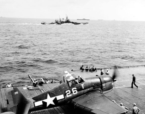 F6F Hellcat – Air Group 16 USS Lexington (CV-16) F6F-3 Hellcat Air Group 16 in tricolor variant aboard USS Lexington CV-16 with pilots before the mission