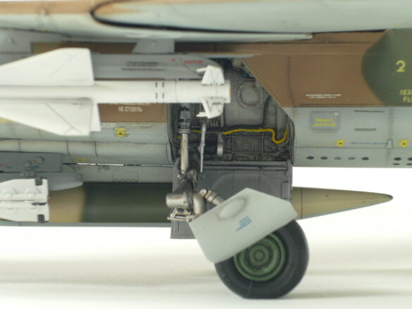 MiG-23ML Red 26 Scale Model Build Guide – Painting, Weathering and Camouflage Techniques MiG-23ML model during camouflage painting process with preshading