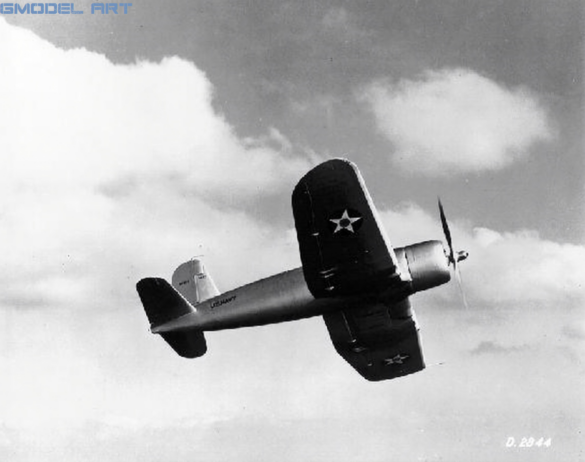 XF4U-1 prototype parked before testing with natural metal finish and pre-war yellow upper wing sections