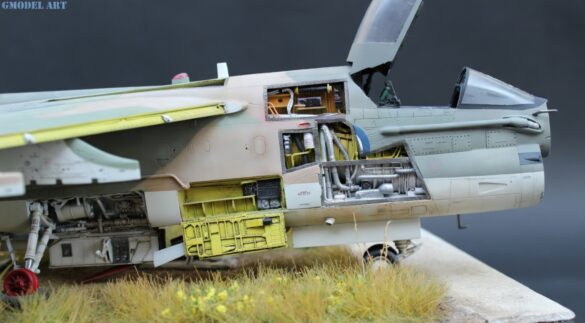 Weathered Hellenic Air Force A-7E Corsair cemetery model with faded camouflage and open maintenance panels.