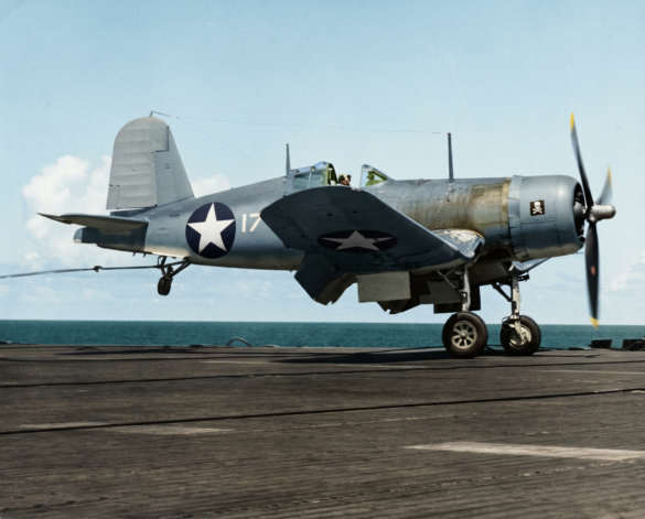 Line of VF-17 F4U-1 Birdcage Corsair fighters displaying different camouflage and production variations