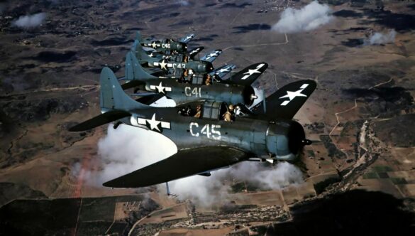 Weathered Douglas SBD Dauntless White C 46 showing faded Blue Gray camouflage and replacement cowling during a training flight.