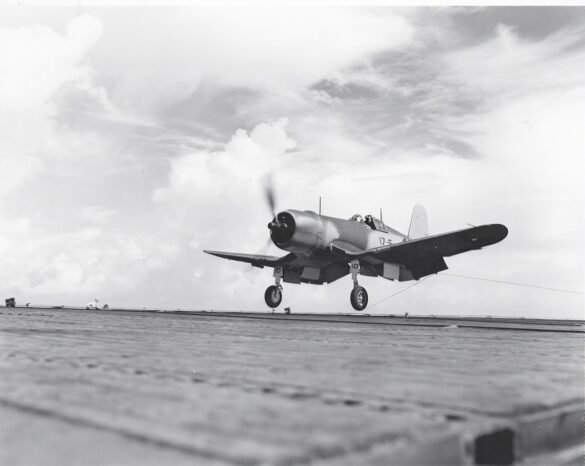 Line of VF-17 F4U-1 Birdcage Corsair fighters displaying different camouflage and production variations