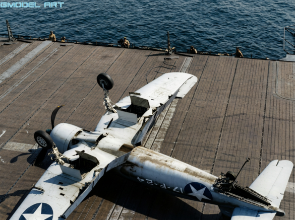 VF-17 F4U-1 Birdcage Corsair 17-F-24 showing white folding wing undersides during field repaint