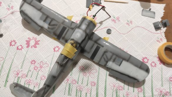 Detailed 1:48 scale F4U-1 Corsair Birdcage model representing VF-17 17-F-31, built with Tamiya, Aires, ICM and Eduard components and displayed on a U.S. Navy aircraft carrier deck.