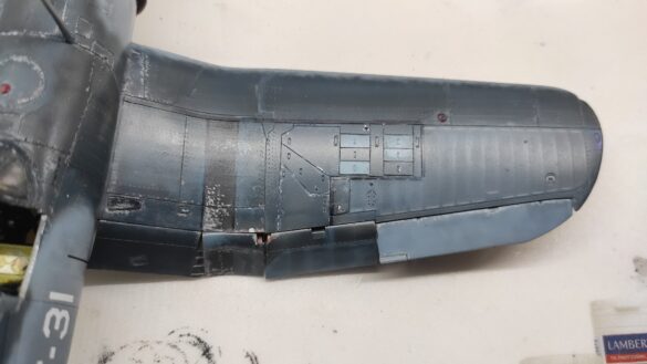Detailed 1:48 scale F4U-1 Corsair Birdcage model representing VF-17 17-F-31, built with Tamiya, Aires, ICM and Eduard components and displayed on a U.S. Navy aircraft carrier deck.