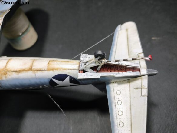 Detailed 1:48 scale F4U-1 Corsair Birdcage model representing VF-17 17-F-31, built with Tamiya, Aires, ICM and Eduard components and displayed on a U.S. Navy aircraft carrier deck.