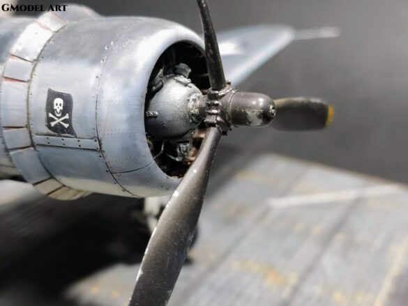 Detailed 1:48 scale F4U-1 Corsair Birdcage model representing VF-17 17-F-31, built with Tamiya, Aires, ICM and Eduard components and displayed on a U.S. Navy aircraft carrier deck.