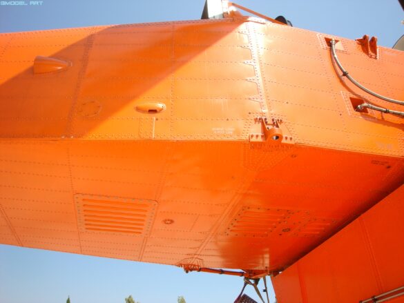 Firefighting water tank mounted beneath the fuselage of a Sikorsky S-64 Skycrane.