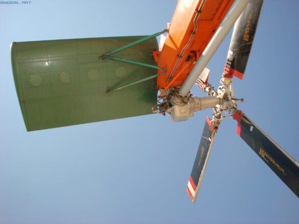 Firefighting water tank mounted beneath the fuselage of a Sikorsky S-64 Skycrane.