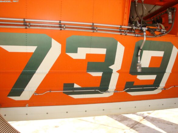 Firefighting water tank mounted beneath the fuselage of a Sikorsky S-64 Skycrane.