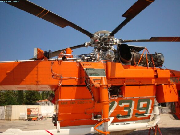 Sikorsky S-64 Skycrane firefighting helicopter operating during wildfire suppression in Greece.