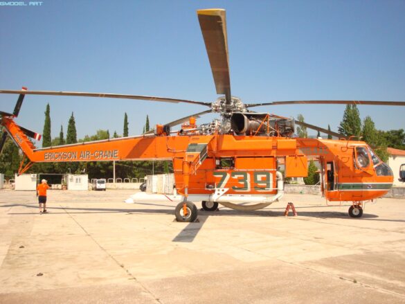 Sikorsky S-64 Skycrane firefighting helicopter operating during wildfire suppression in Greece.
