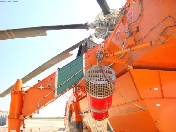 Sikorsky S-64 Skycrane firefighting helicopter operating during wildfire suppression in Greece.